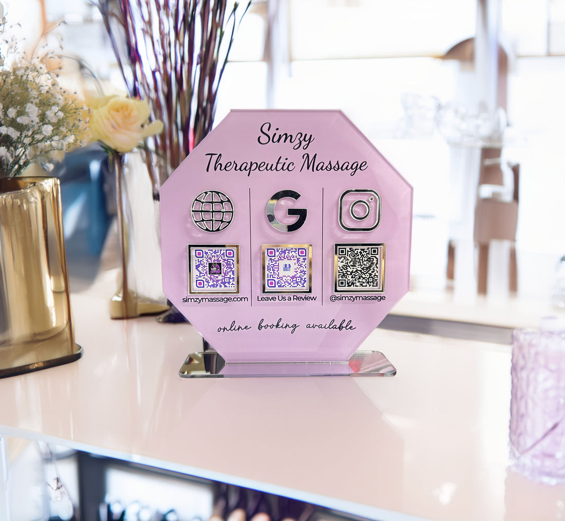 Pink acrylic QR code sign with scannable payment and social links