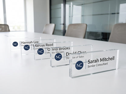 Matching acrylic name plates for a whole team lined up on a conference table