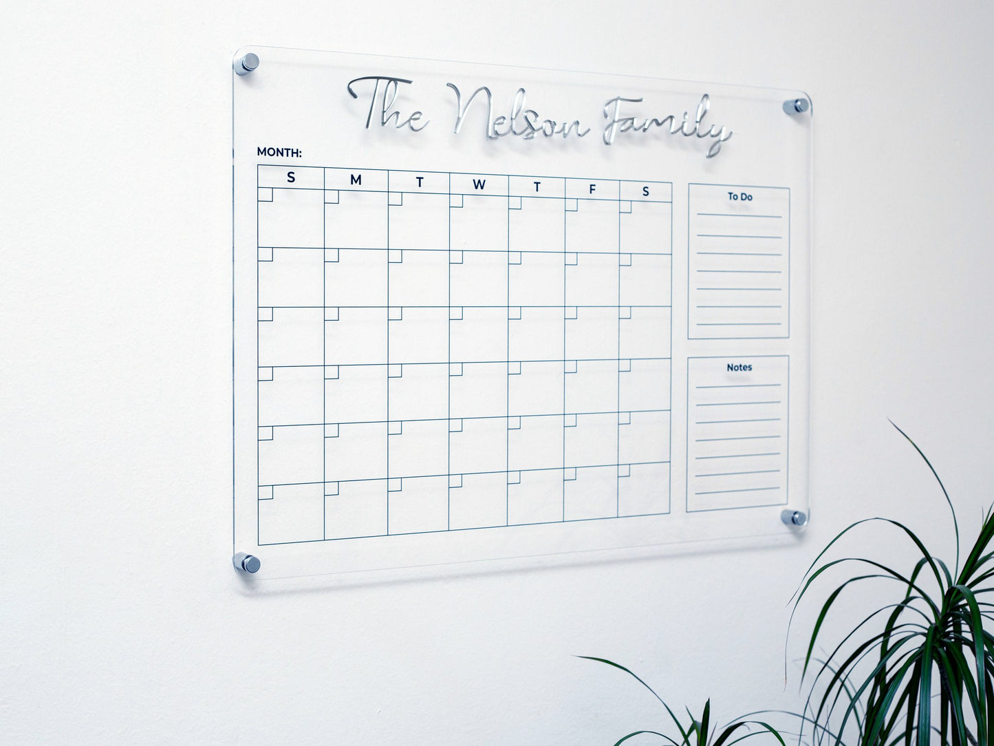 Acrylic family planner with 3D silver title and silver standoffs