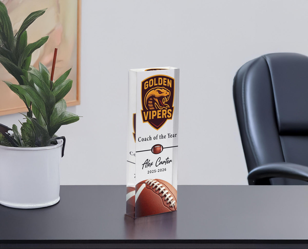 Personalized acrylic football trophy with Coach of the Year award title