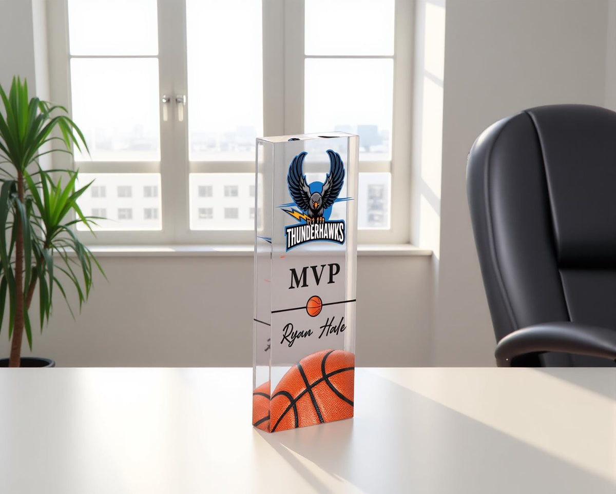 Acrylic basketball team award on an office desk